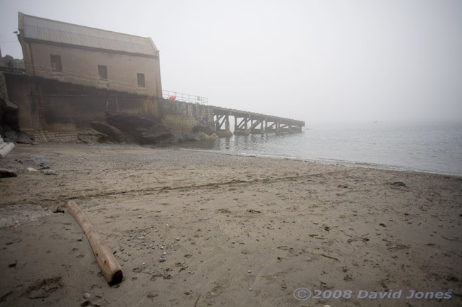 Polpeor Cove in the mist - towards the old lifeboat station