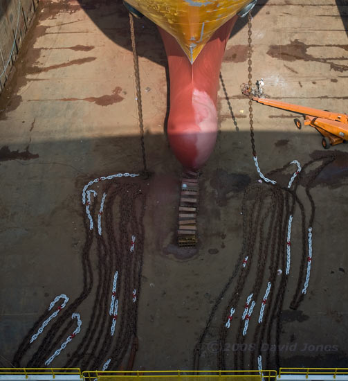 The anchor chain of a container ship in dry dock