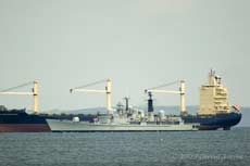 HMS Edinburgh passes a large bulk carrier, 11 June 2009