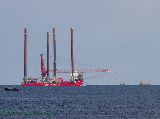 The Jack-Up Barge 'Excalibur', about to pass the Bolt 'Lifesaver', 7 Sept 2013